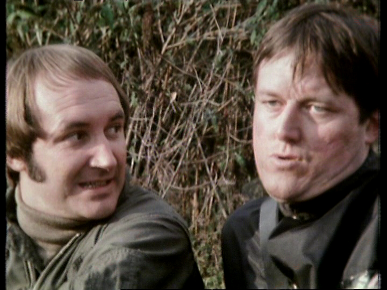 Concerned Vila looking at nastily lustful Doran