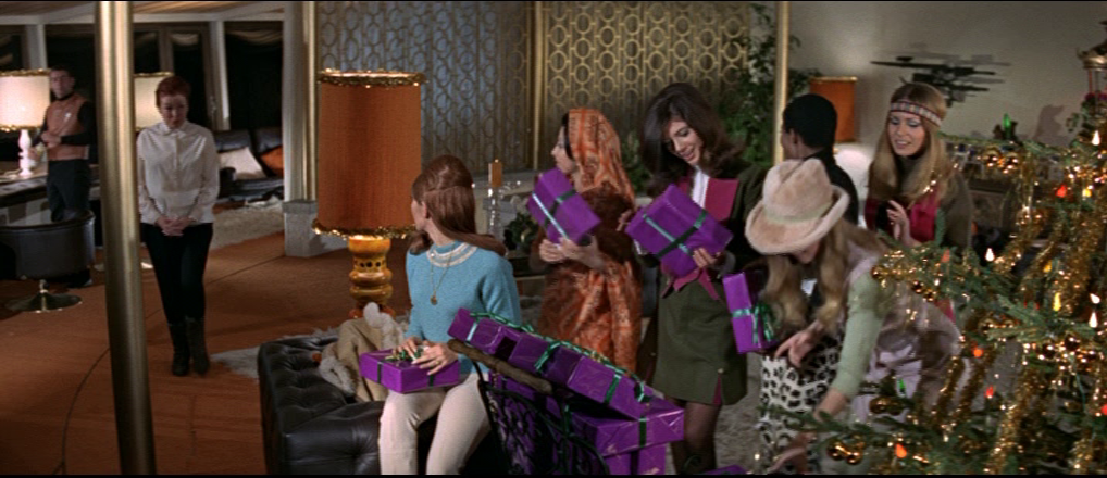 Angels of Death gathered and picking up presents next to Christmas tree