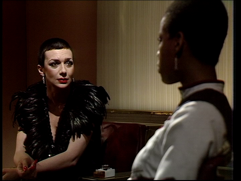 Servalan watching Dayna in the torture chair