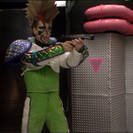 space rat in green with yellow mohican