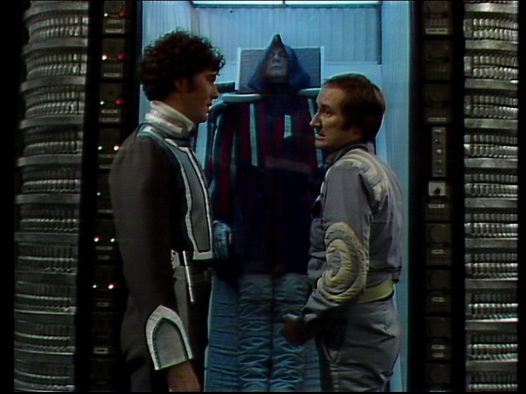 Tarrant and Vila in front of the cryogenic unit