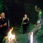 Servalan and friends around a fire