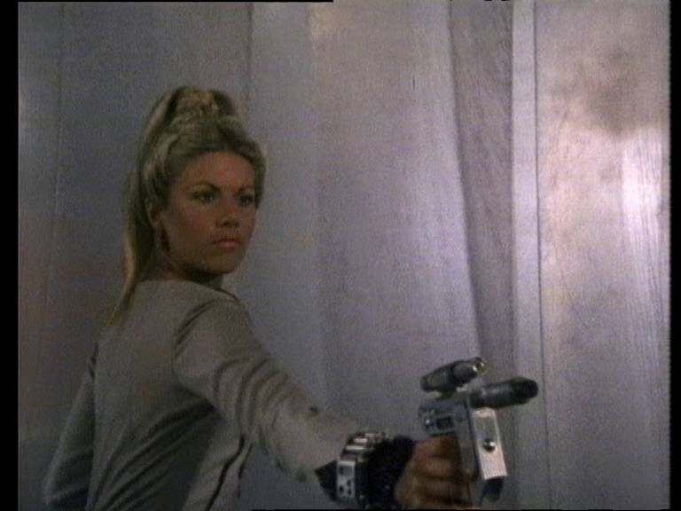 Soolin firing her gun off camera