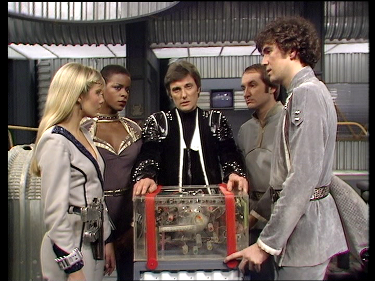 The crew gathered around Orac on Scorpio