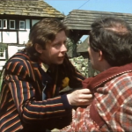 ford grabbing arthur with house visible behind