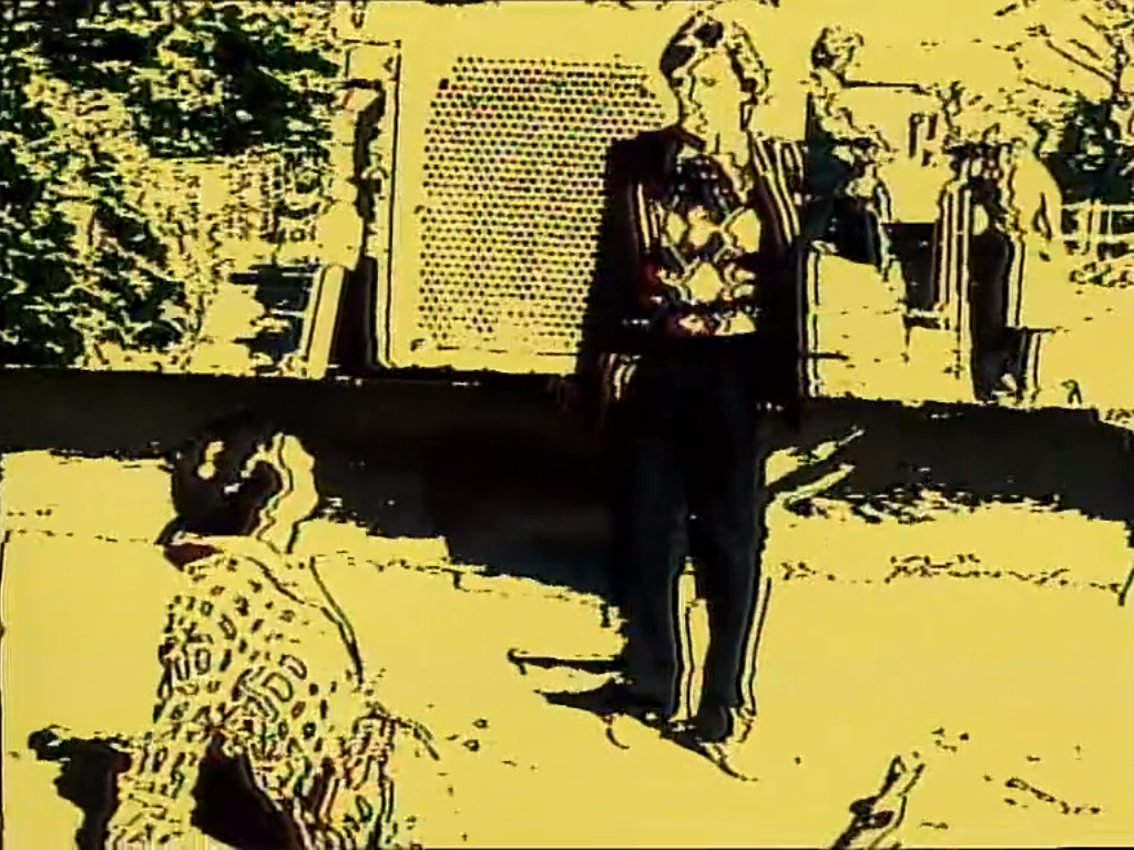 ford standing by bulldozer with arthur lying down