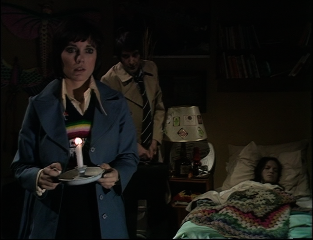 Jenny looks shocked as Andrew looks down at Pat's dead body in bed