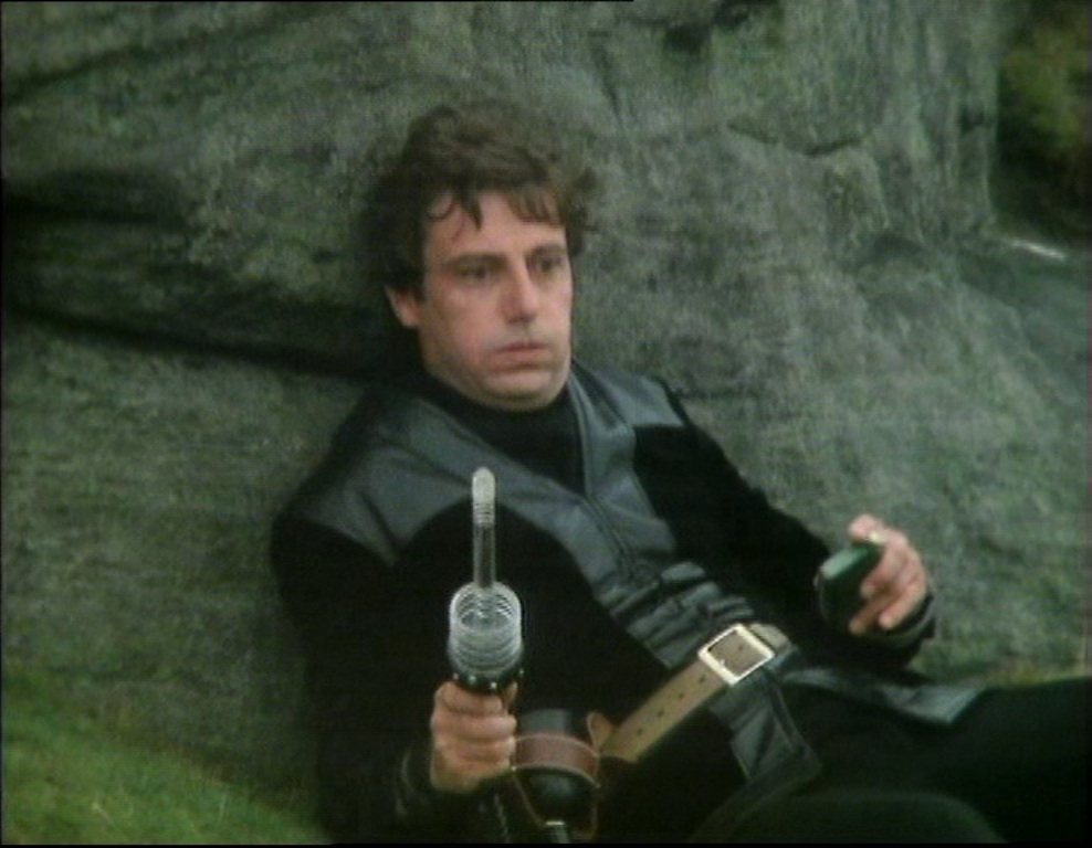 Avon sits down knackered with gun out