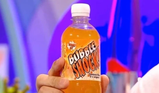 Bottle of Bubble Shock being held up