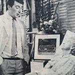 A doctor looks down at Gladys Cooper as a patient in a hospital bed